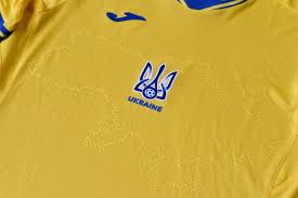 The base colour is a very pale blue with a smart dark blue collar. Euro 2020 Uefa Orders Ukraine To Remove Political Slogan From Kit The Athletic