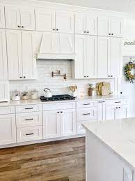 Matte black hardware is also popular in farmhouse and rustic kitchen styles. Revival Home Designs Kitchen White Shaker Kitchen Cabinets White Shaker Kitchen Kitchen Style