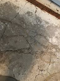 crumbling concrete flooring under