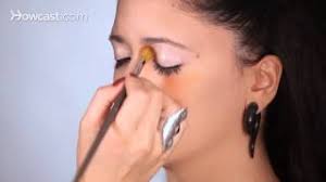 color a fake black eye with makeup