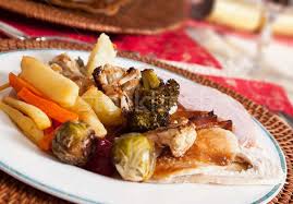 The pudding (which is more like cake) was made with stale bread crumbs, scalded milk, raisins, figs, currants, wine brandy, suet, and spices like cinnamon, nutmeg, and cloves. Traditional English Christmas Lunch Stock Photo C Backyardproductions 1479367 Stockfresh