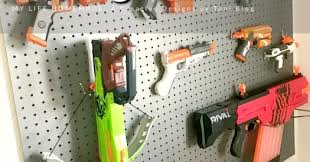 Make your own diy nerf gun camo peg board with led lights behind it! Diy Nerf Gun Storage Wall My Life Homemade