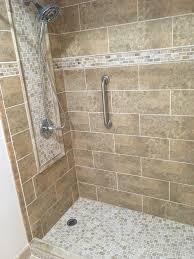 tile shower with inlaid accents