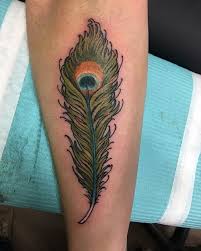 Another cool idea is to get subtle and more meaningful tattoo design of your favourite animal or bird. Top 30 Peacock Feather Tattoos Best Peacock Feather Tattoo Designs
