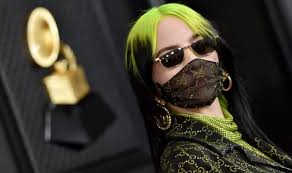 In true billie eilish style, the artist went with an oversized shirt and matching shorts for a performance, but this time, the graphics featured the initials of her name. Billie Eilish Gave Glimpse Of Her Tattoo After Saying She Would Never Reveal It Music Entertainment Moradabad News Moradabad Business