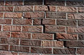 Repair brick wall cracks by epoxy resin injection, grout, and mortar. Noticing Stair Step Cracks In Exterior Brick