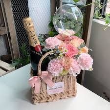 handbag basket of flowers with mini