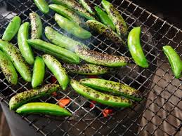 Place several charcoal briquettes in the grill. For Better Grilled Vegetables Use Your Chimney Starter