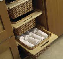The baskets may also be installed between two cabinets. Cabinet Solutions