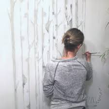 painting a birch tree mural on our