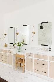 Bathroom vanities are a combination of both the sink and the surrounding storage and are sold in double vanity. Dual Bath Vanity With Drop Down Middle Drawers Design Ideas