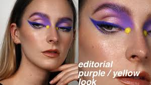 editorial purple and yellow makeup look