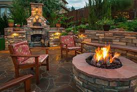 How To Add Exterior Warmth With A Fire Pit
