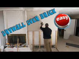 How To Drywall Over Brick