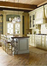 For that french country flair, you can simply refurbish your wood kitchen cabinet finishes and paint them all white. Cottage French Country Kitchen Country Kitchen Designs French Country Kitchen Cabinets Cottage Kitchen Cabinets