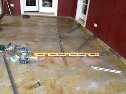 How to Level a Sloped, Uneven Concrete Floor