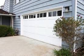 white wood garage door with window