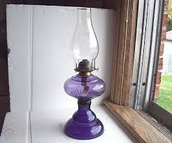 beautiful 110 yr old purple glass oil