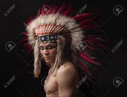 Naked Indian Strong Man With Traditional Native American Make Up And  Headdress Looking At The Camera. Studio Shot Stock Photo, Picture and  Royalty Free Image. Image 34025960.