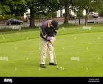 A Man Playing Pitch & Putt Golf in the grounds of Woodthorpe ...