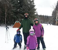 skiing family at bolton valley resort