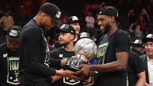 1 of 20 milwaukee bucks forward giannis antetokounmpo reacts while holding the nba championship trophy, left, and most valuable player. Milwaukee Bucks Finally Break Through After Most Vulnerable Moment Nba News Sky Sports