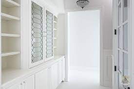 Closet With Leaded Glass Cabinet Doors