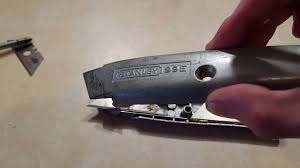 change the blade on a utility knife