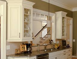 Typically, with stock kitchens, your countertops will overhang the base cabinets by 3/4 of an inch. Innovation Counter Depth Upper Cabinets