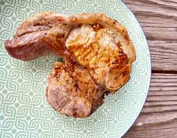 smoked pork chops on a pellet grill in