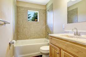 Empty Bathroom With Tile Wall Trim And