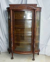 antique oak china or curio cabinet