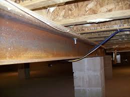 moisture on basement support beams