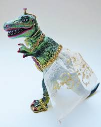 dinosaurs wearing makeup and jewelry
