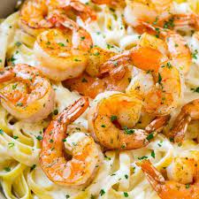 Shrimp Alfredo In A Skillet Topped With Chopped Parsley Shrimp  gambar png
