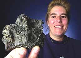 Until then, I&#39;m keeping it close to me.&quot; Diane Lavoie of Manchester holds a possible meteorite she found in her backyard. (photo by THOMAS ROY/UNION LEADER) - 04292005
