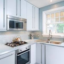 Materials like slate, glass and metal can give your kitchen backsplash elegant style. 75 Beautiful Small Kitchen With Blue Backsplash Pictures Ideas May 2021 Houzz