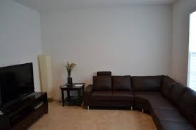 living room with chocolate brown couch