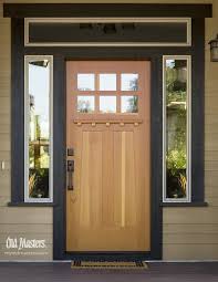Natural Wood Front Door With Dark Trim