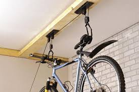 Lots of bike lifts for garage to choose from. 35 Garage Hacks That Are Borderline Genius Loveproperty Com