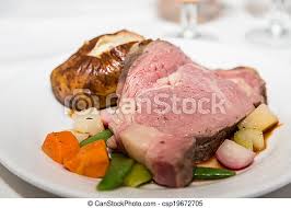 Prime rib is also known as standing rib roast by some. Prime Rib With Vegetables And Baked Potato Slice Of Rare Prime Rib And Baked Potato On A Plate With Fresh Vegetables Canstock