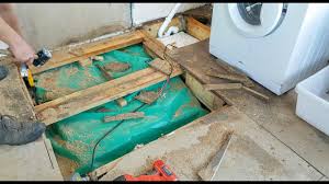 water damaged chipboard floorboards