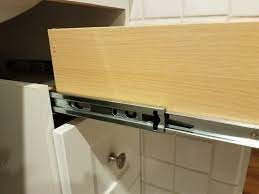 How do I remove this cabinet drawer? - Home Improvement Stack Exchange
