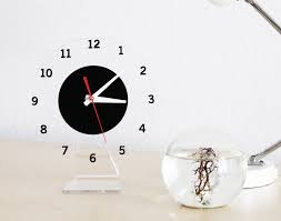 The kittykat clock, a modern analogue clock that adds a pop of color to any room. Contemporary Desk Clocks Ideas On Foter