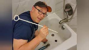 how to unclog a bathtub drain dad