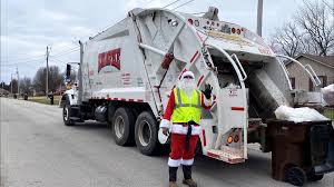 The truck was laying on its side, which impacted traffic on part of route 8 during the afternoon rush. Santa Brings Merry Christmas Cheer On Kentucky Garbage Route Whas11 Com