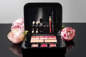 make up case with cosmetics and flowers