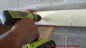 how do you attach wood to concrete