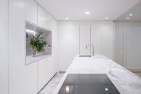 kitchen white cabinets marble floors