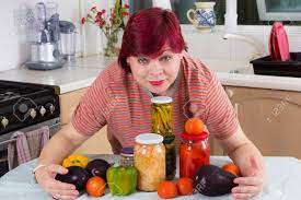 Happy Mature Housewife Posing With Homemade Pickles In Kitchen Stock Photo,  Picture and Royalty Free Image. Image 60806813.